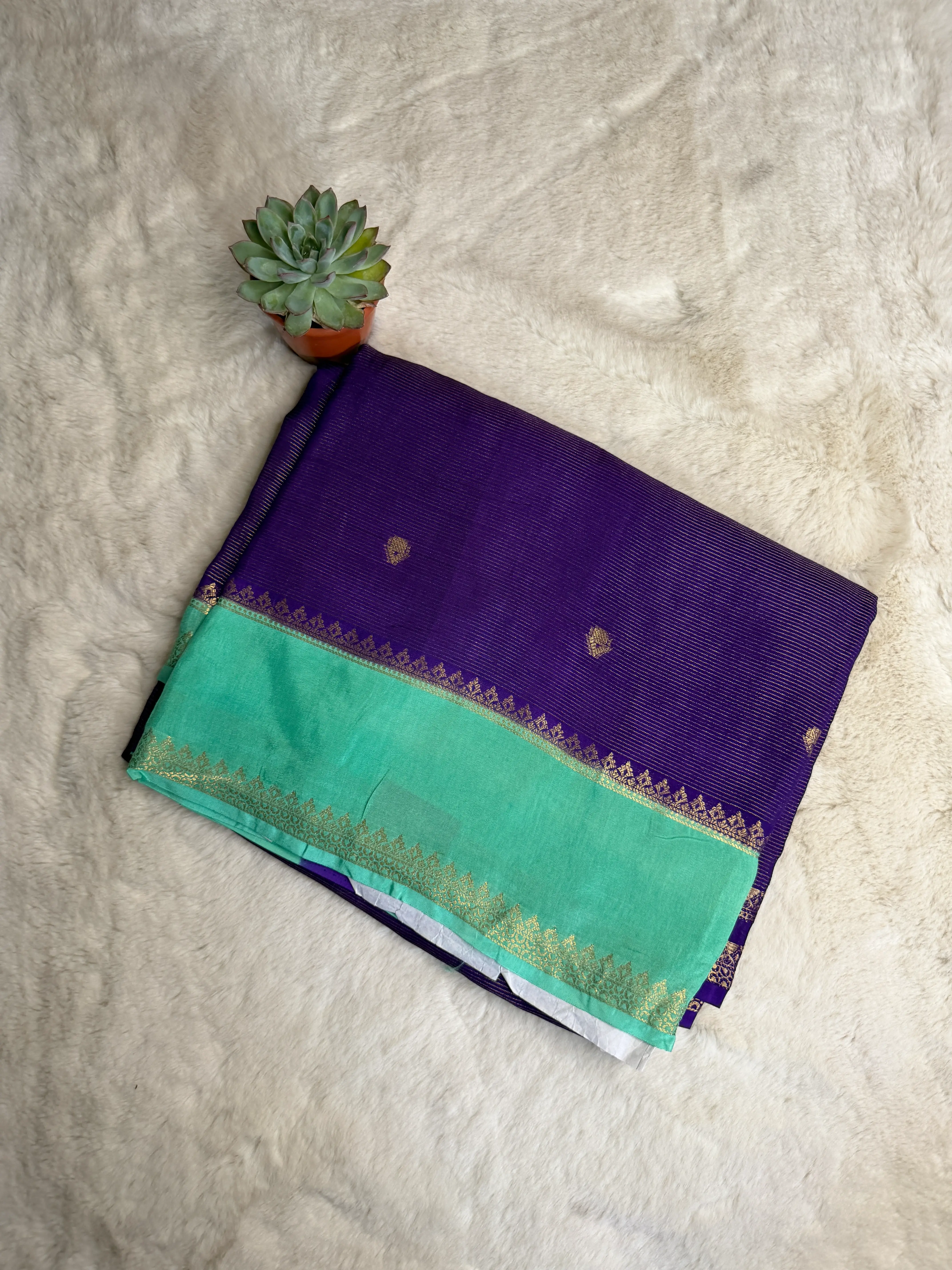 Purple with Sea Green border Micro Stripes all over the body semi crepe Saree