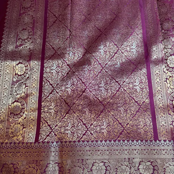 Maroon with rich border and pallu semi crepe saree