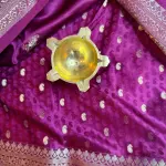 Maroon with rich border and pallu semi crepe saree