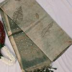 Olive Green Tissue Saree with Sequin Work and Nature Print Accents