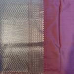 Peach pink with buttas benaras saree