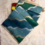 Teal Blue Lehariya pattern pure kora organza saree