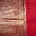 Black and red border with small buttas kora organza saree
