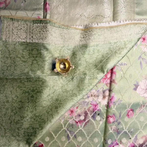 Pista Green Floral Pattern with buttas Muga Silk Saree