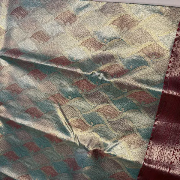 Blue & Maroon rich pallu tissue semi silk