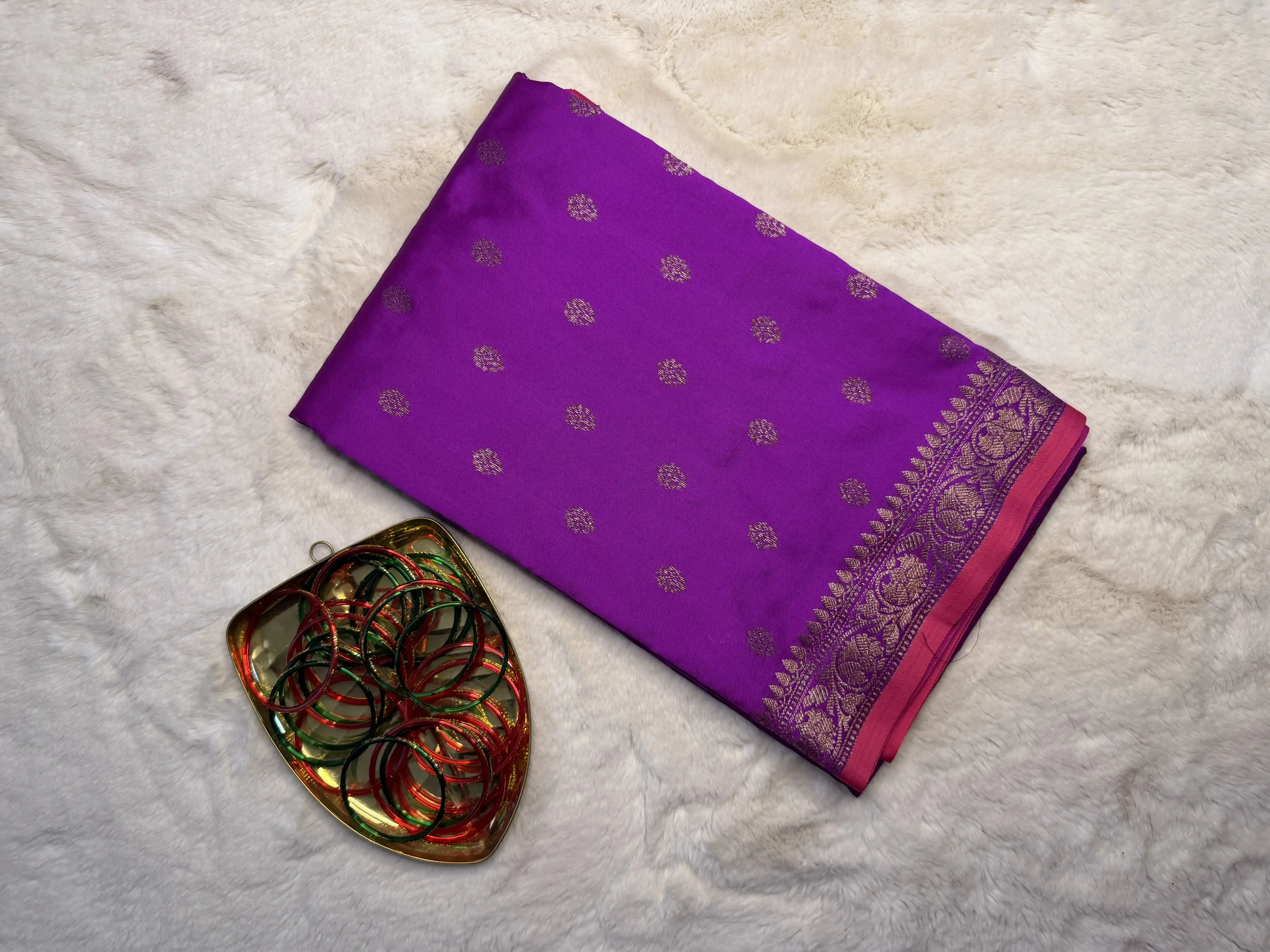 Dark pink with small buttas semi benaras saree