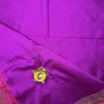 Dark pink with small buttas semi benaras saree