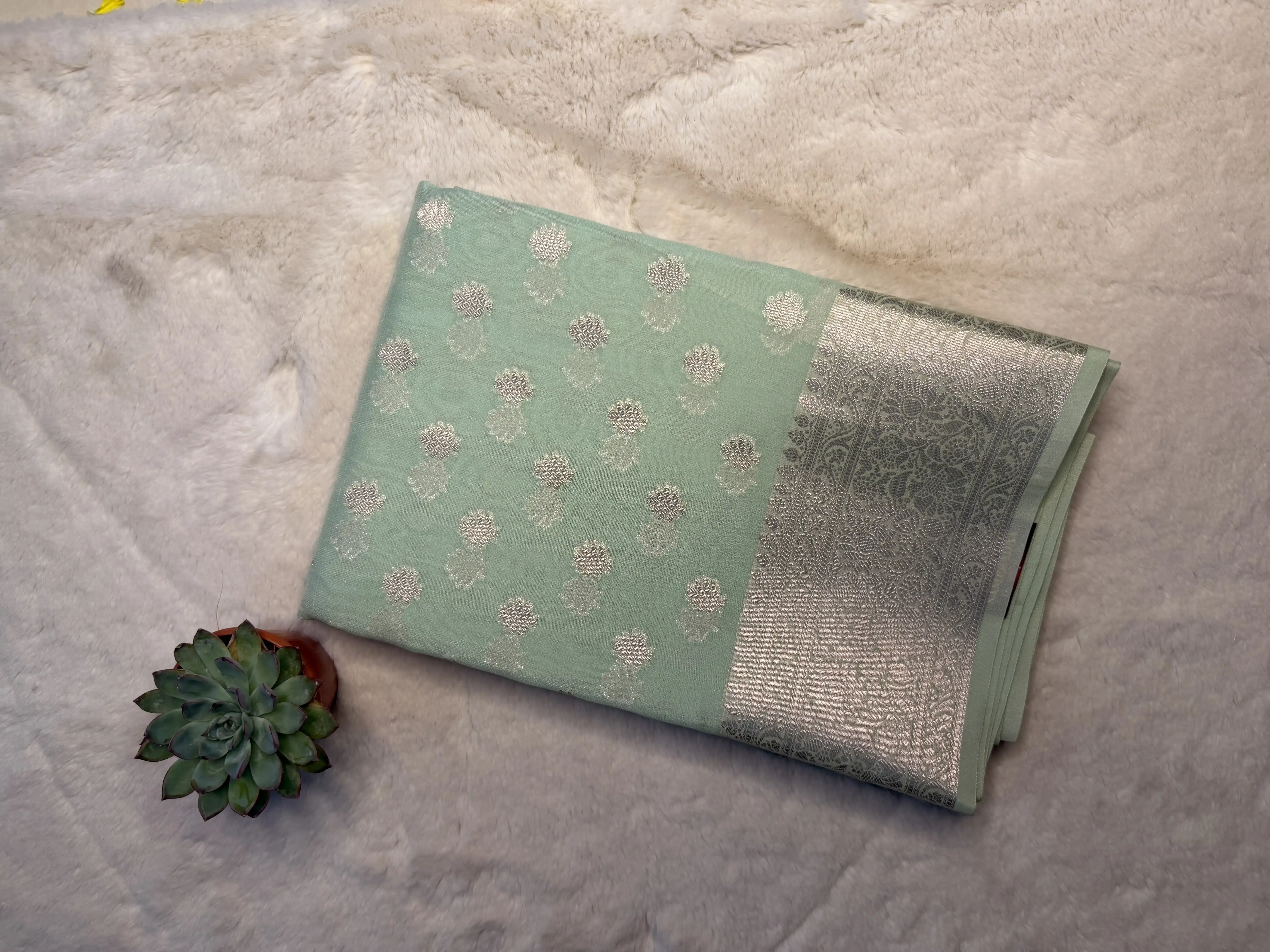 Lemon yellow with buttas chiffon saree