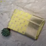 Lemon yellow with buttas chiffon saree