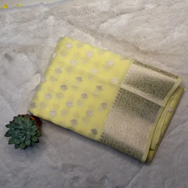 Lemon yellow with buttas chiffon saree