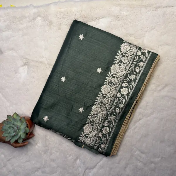 Dark green thread work semi raw silk saree