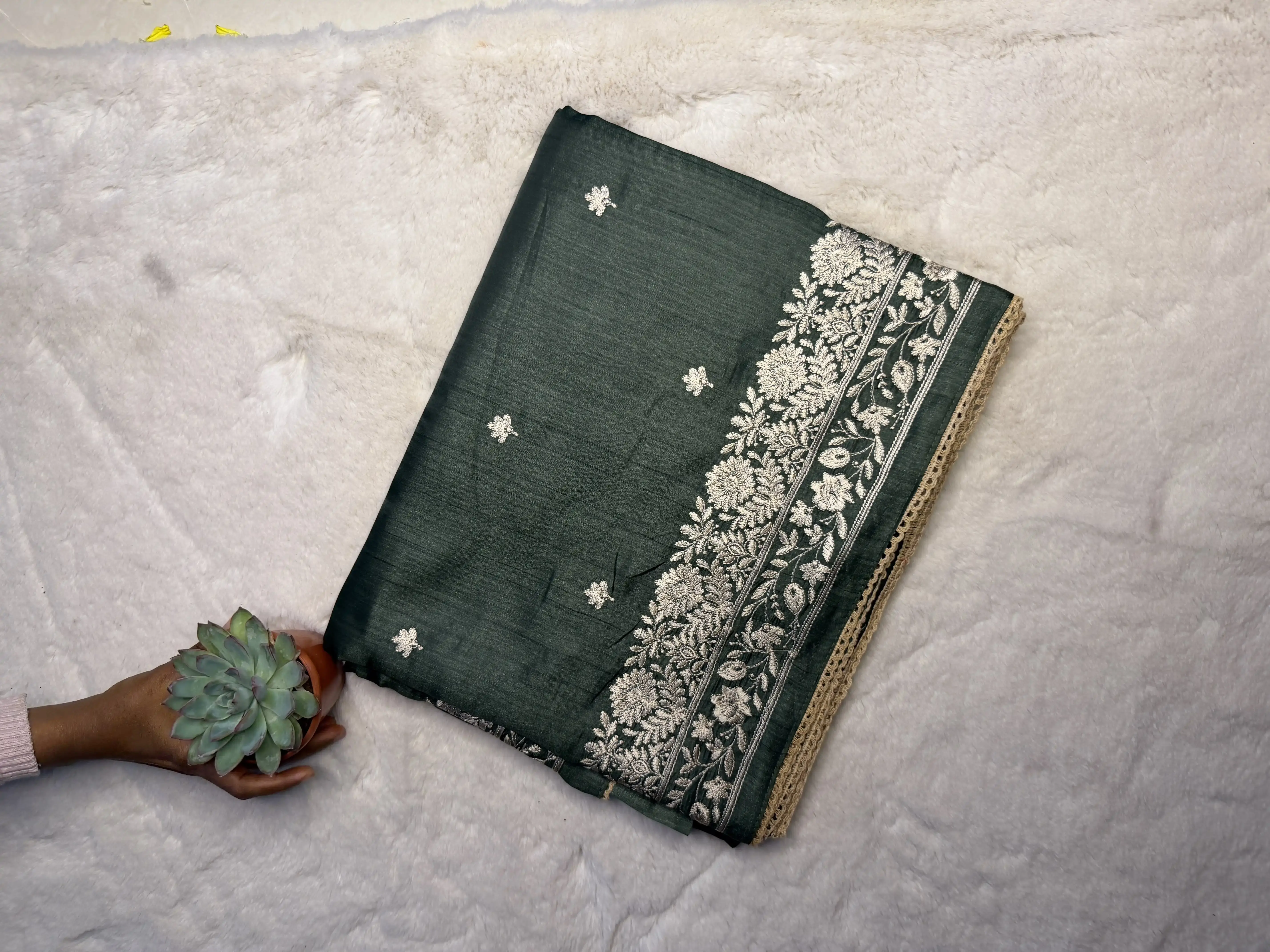 Dark green thread work semi raw silk saree