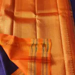 Navy blue microchecks with orange bentex border Pure kanchipuram silk saree
