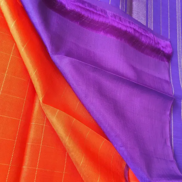 Orange checks with small motifs and purple pallu Pure kanchipuram silk saree