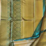 Dark green all over zari body with contemporary border silk sarees
