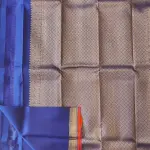 Royal blue small buttis with orange border pure silk saree