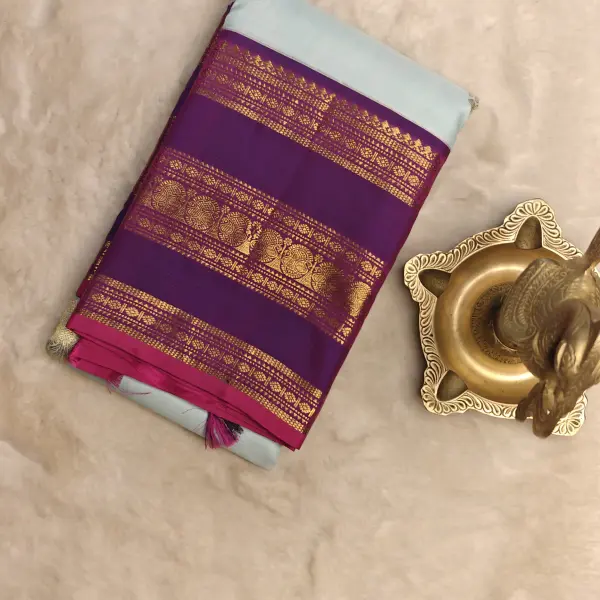 Sky blue small motif with rich bentex border Pure Kanchipuram silk saree