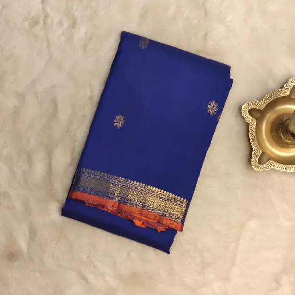 Royal blue small buttis with orange border pure silk saree
