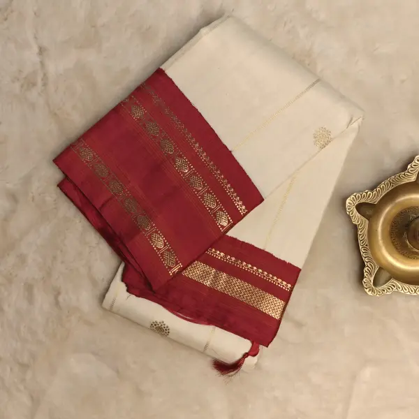Cream checks with small motifs and red border traditional silk saree
