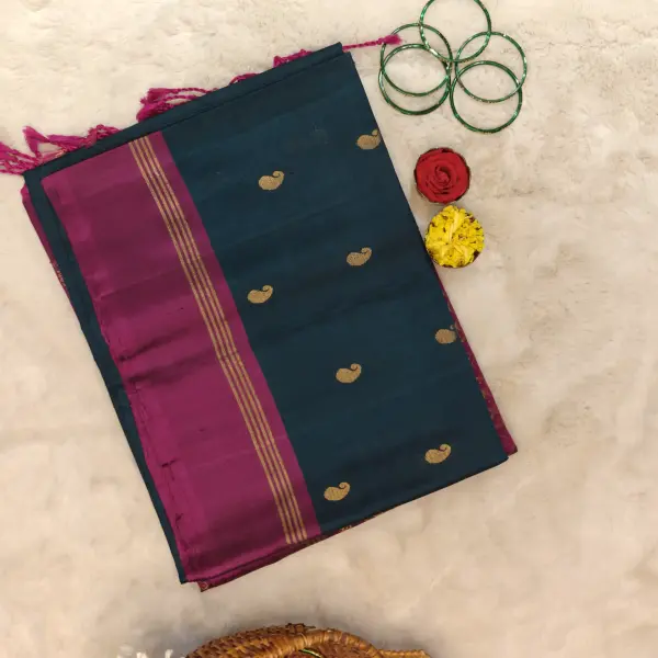 Dark green and maroon with mango motifs and kolam pallu soft silk saree