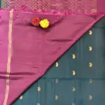Dark green and maroon with mango motifs and kolam pallu soft silk saree