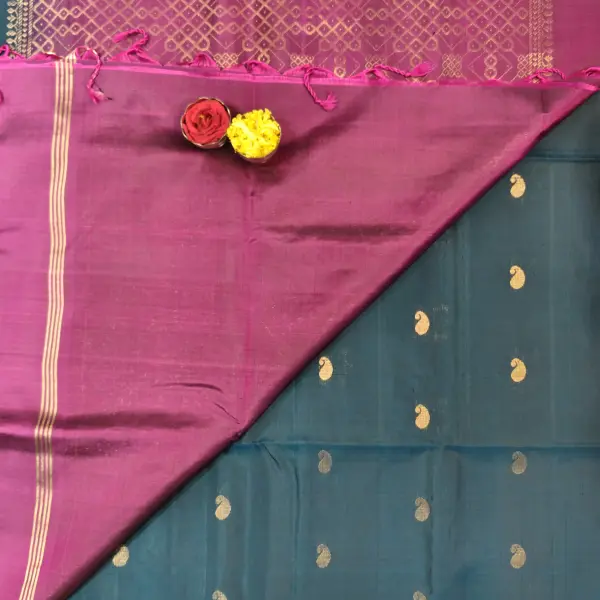 Dark green and maroon with mango motifs and kolam pallu soft silk saree