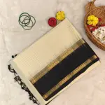 Cream checks with classic black soft silk saree