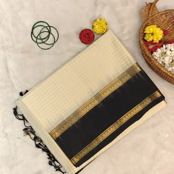 Cream checks with classic black soft silk saree