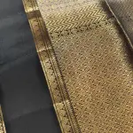 Cream checks with classic black soft silk saree