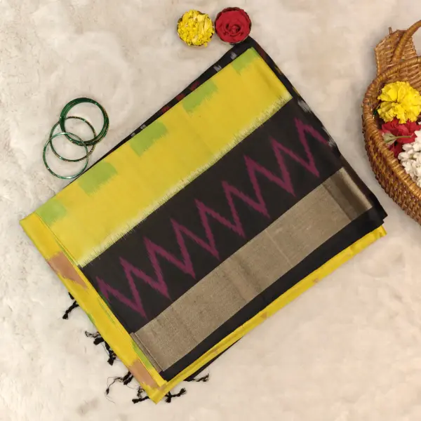 Yellow and black Ikkat pattern soft silk saree
