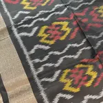 Yellow and black Ikkat pattern soft silk saree