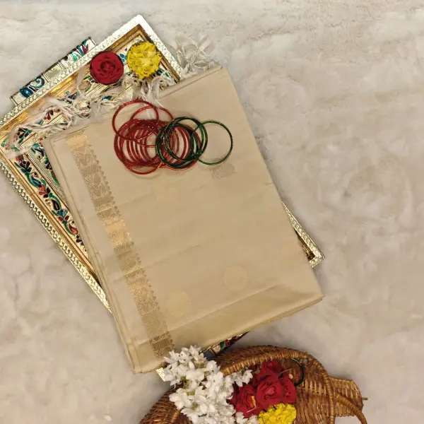 Cream Self design jaal pattern with peacock motif soft silk saree