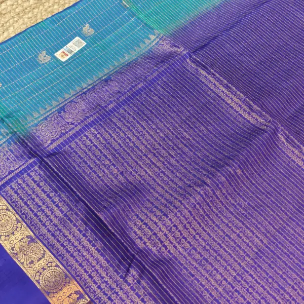 Peacock blue with navy blue bentex border soft silk saree