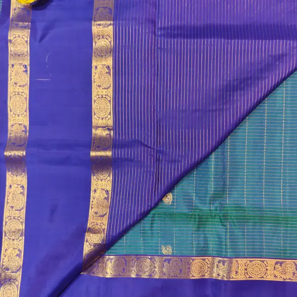 Peacock blue with navy blue bentex border soft silk saree