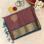 Light brown with teal blue classic border soft silk saree