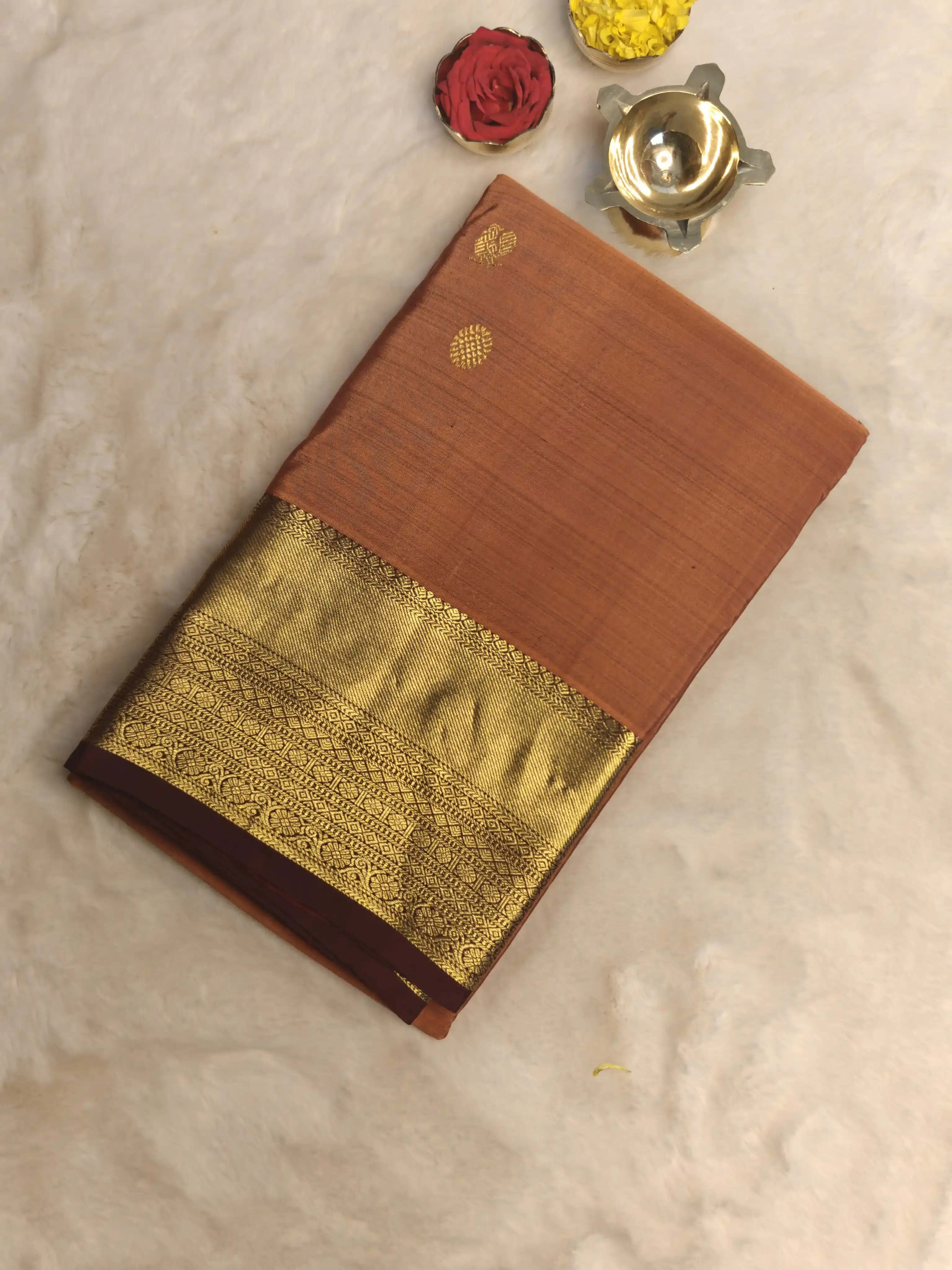 Rust Orange small motifs rich border silk saree