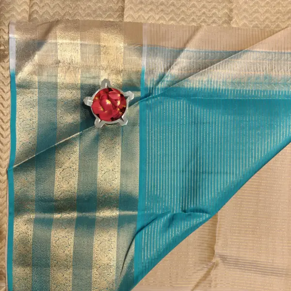 Cream with Teal blue long border silk saree
