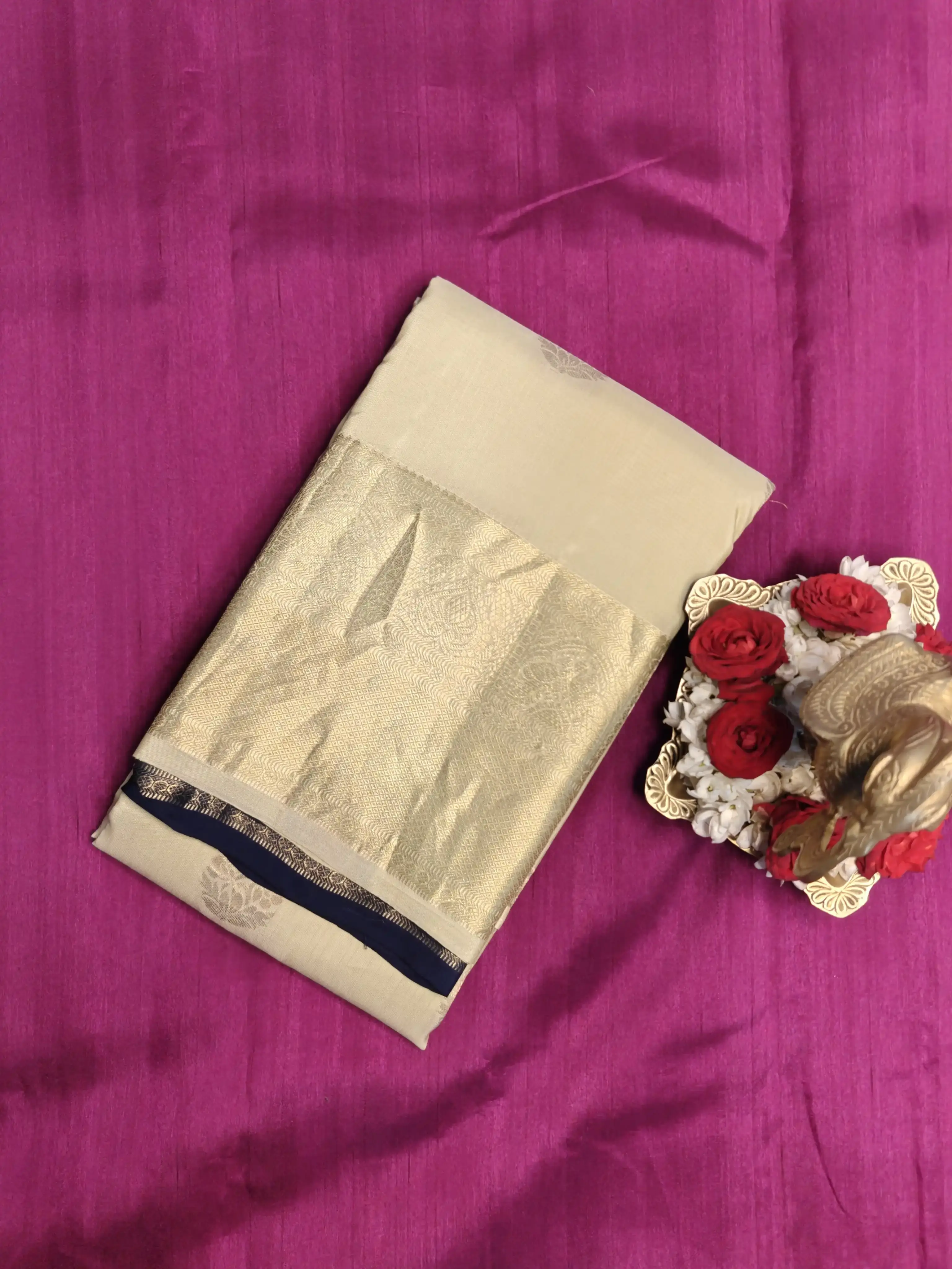 Cream large motifs with navy blue contrast silk saree