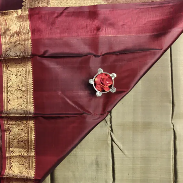 Mehendi green with maroon contrast silk saree