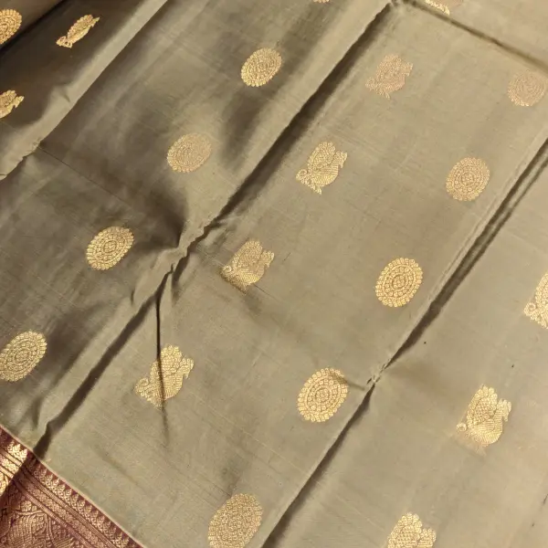 Mehendi green with maroon contrast silk saree