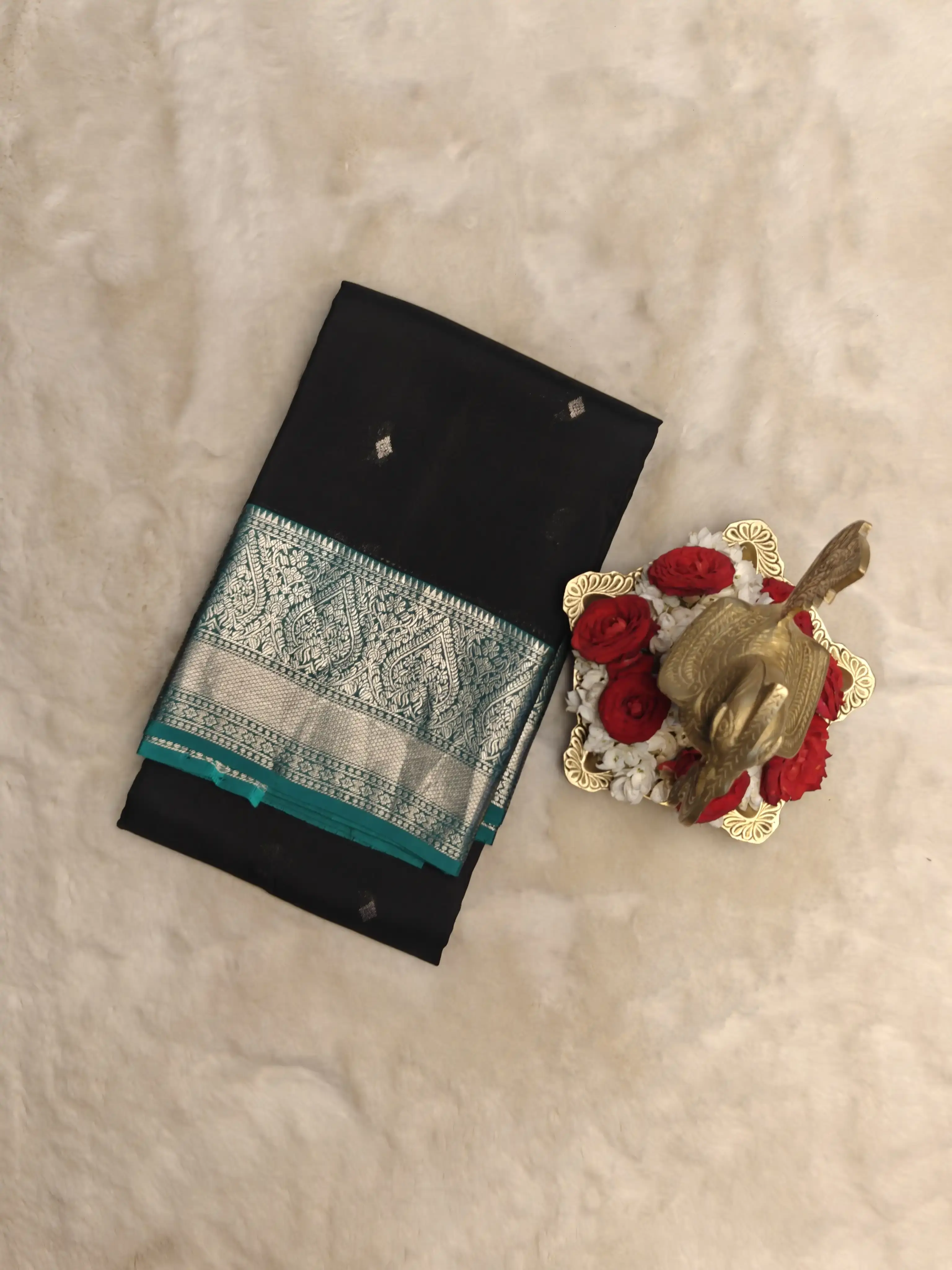 Black and teal blue small motifs silk saree