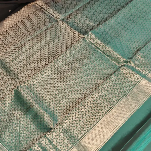 Black and teal blue small motifs silk saree