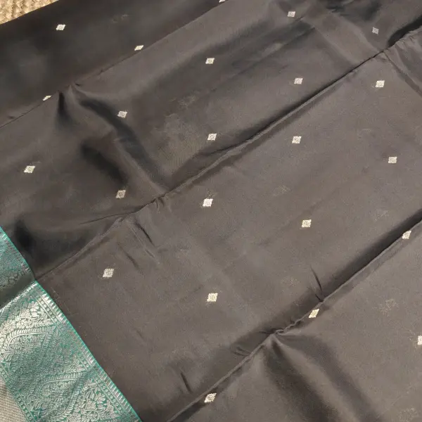 Black and teal blue small motifs silk saree