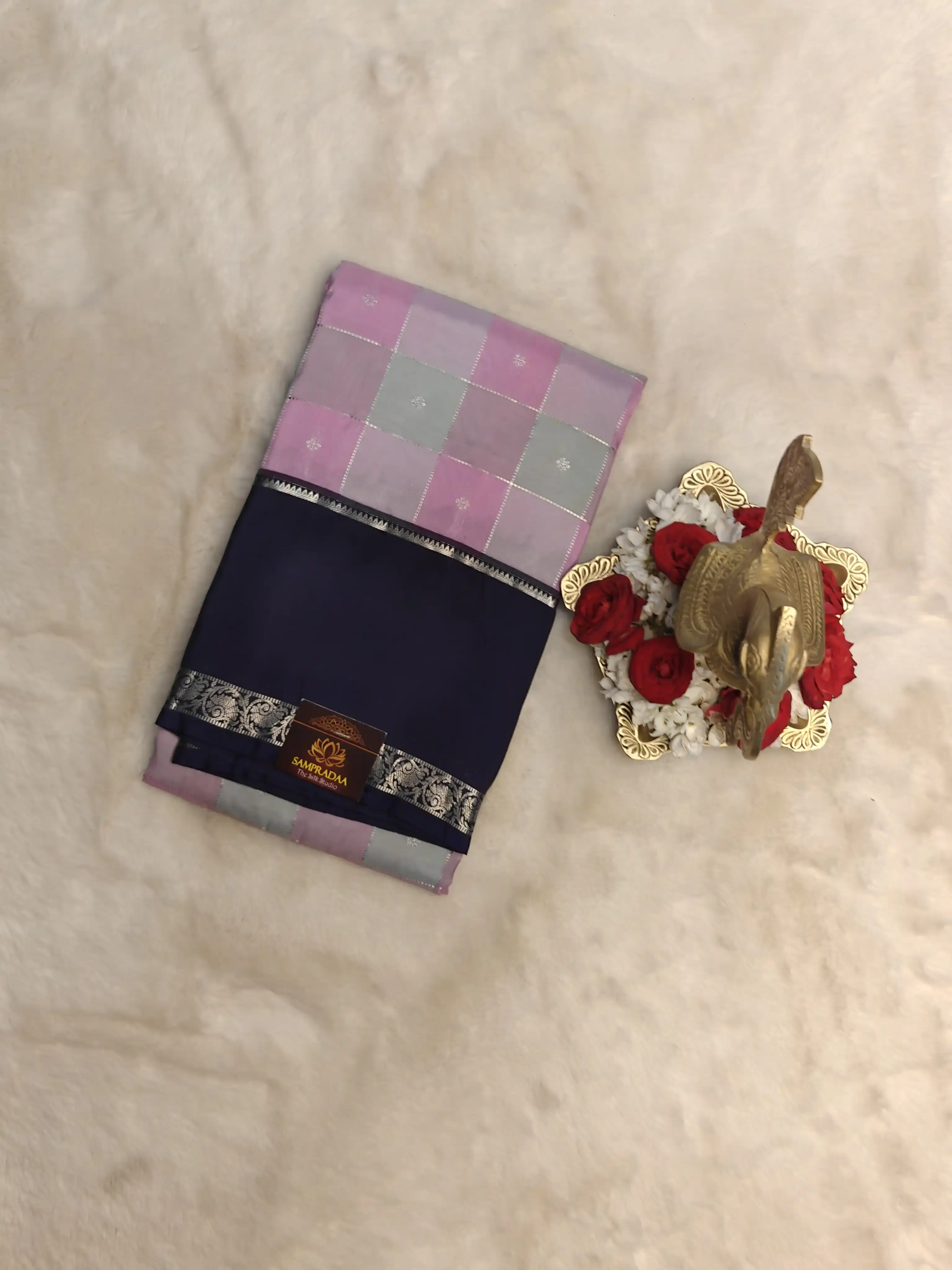 Baby pink and grey checks with navy blue bentex border silk saree