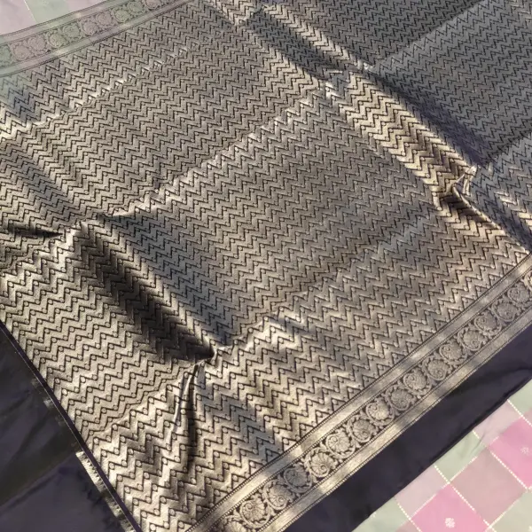 Baby pink and grey checks with navy blue bentex border silk saree