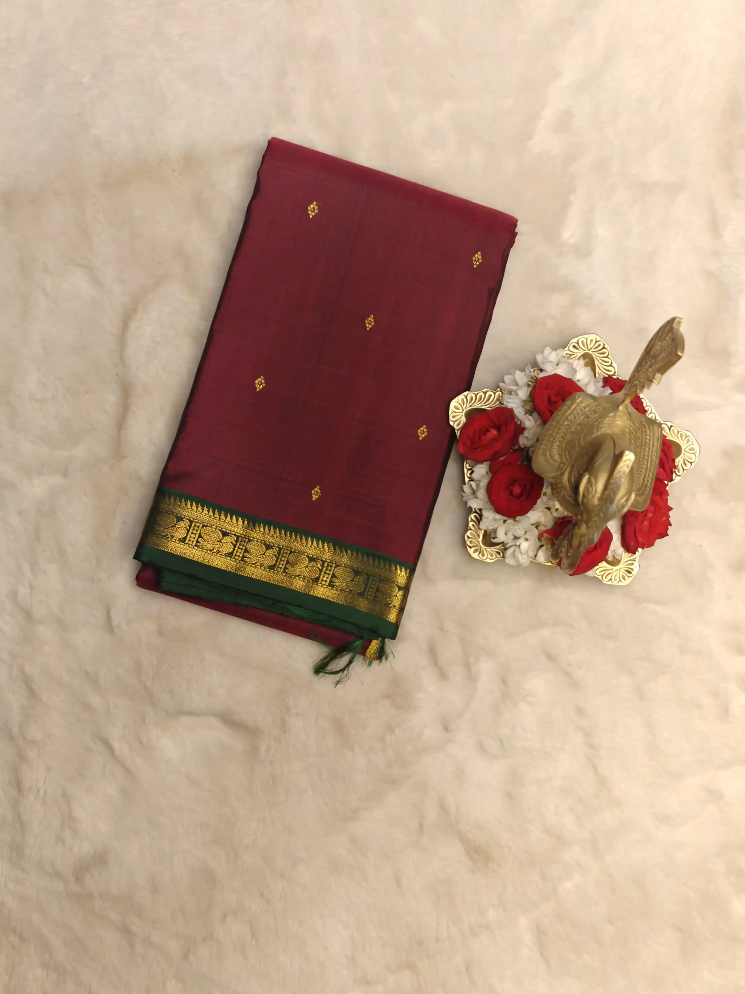 Maroon and green border small motifs silk saree