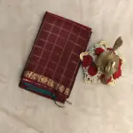 Brown checks with blue contrast peacock border silk saree