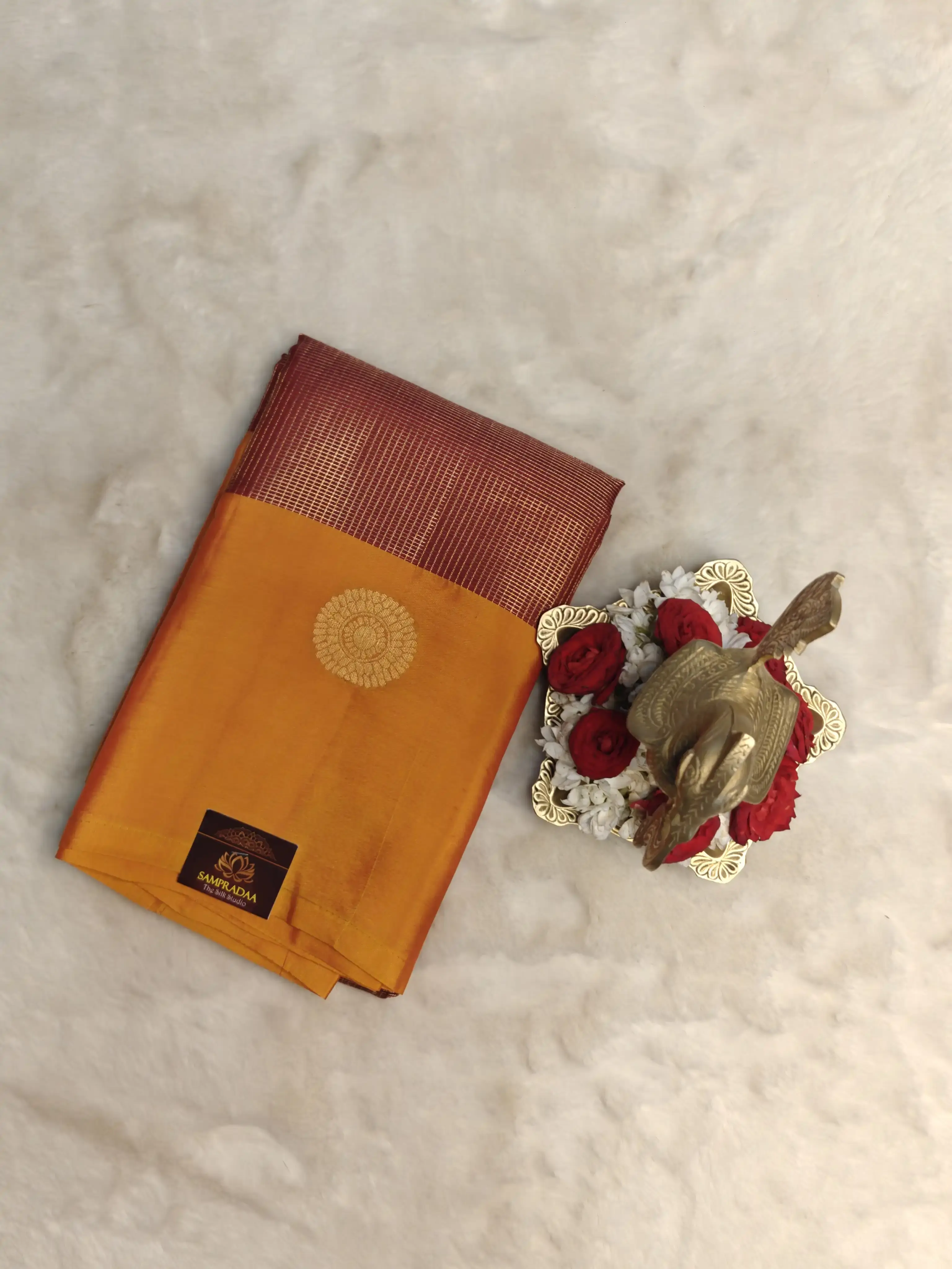 Brick red with yellow long border silk saree