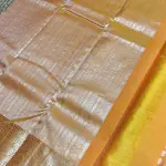 Yellow with silver flower border silk saree