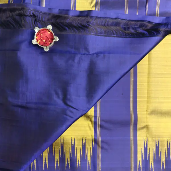 Mustard yellow with purple temple border silk saree